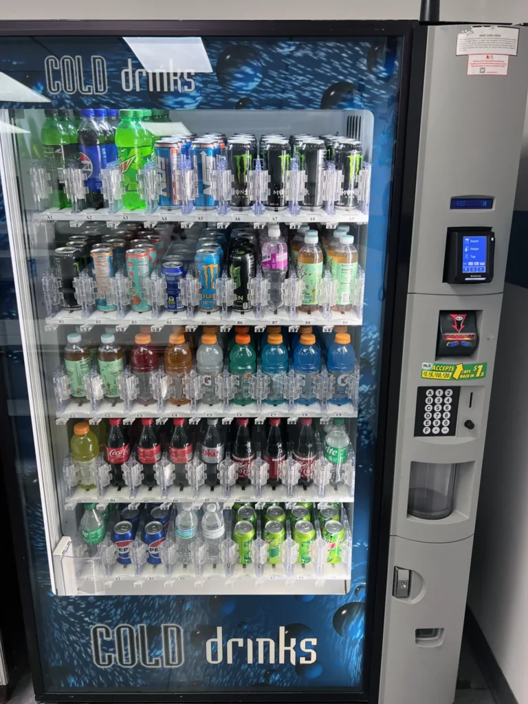 Fully stocked drink machine in a warehouse